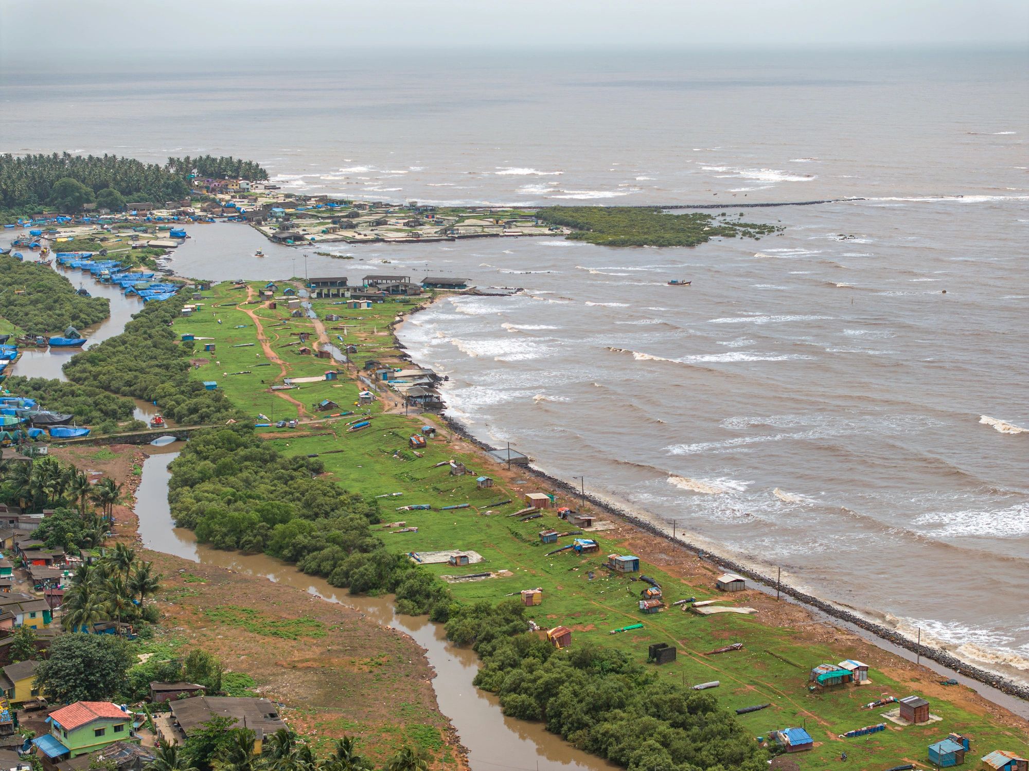 Coastal aerial view evoking scenic travel and local exploration